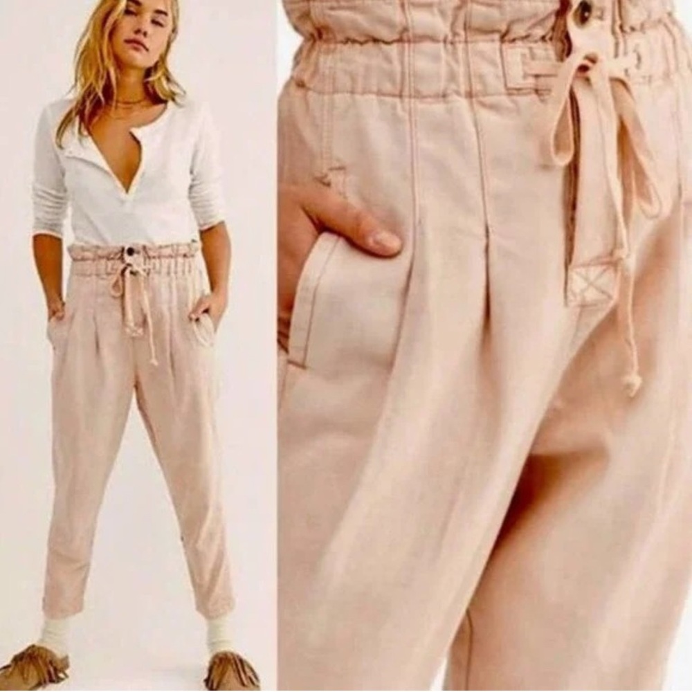 Free People Margate Pleated Trousers in a blush pink.